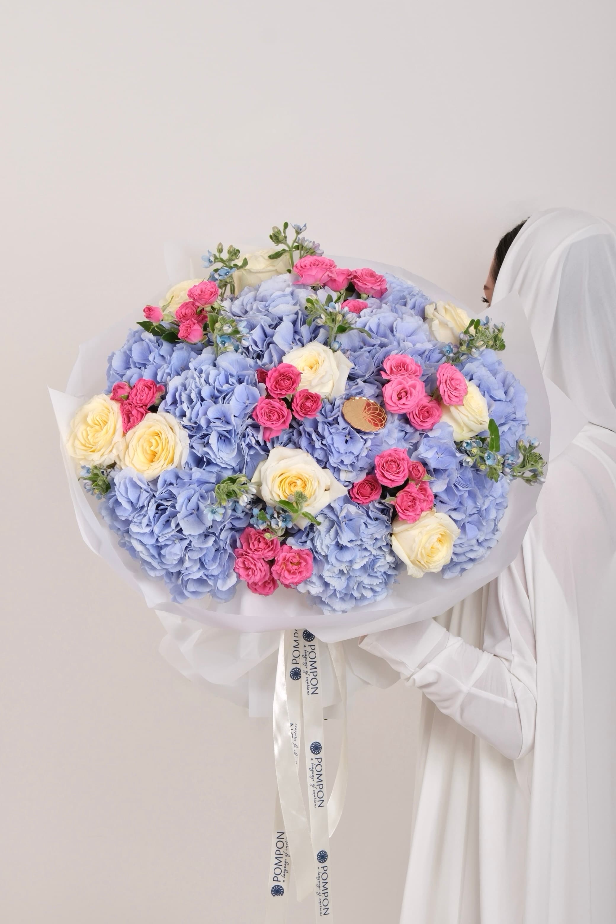 Hydrangea, white roses & spray roses